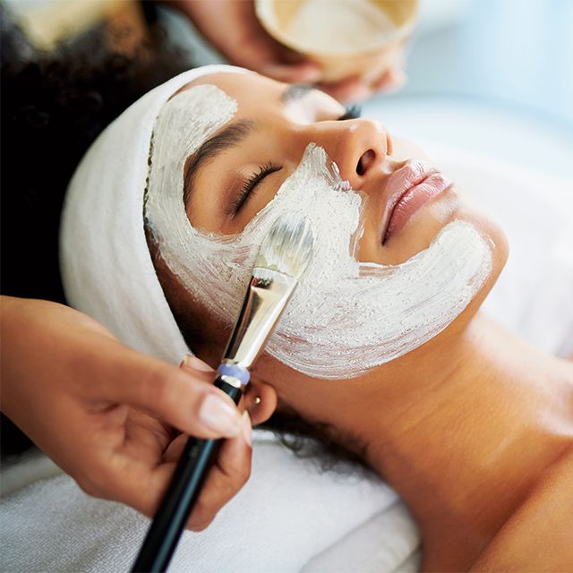 woman having a facial at AlchemyMedSpa